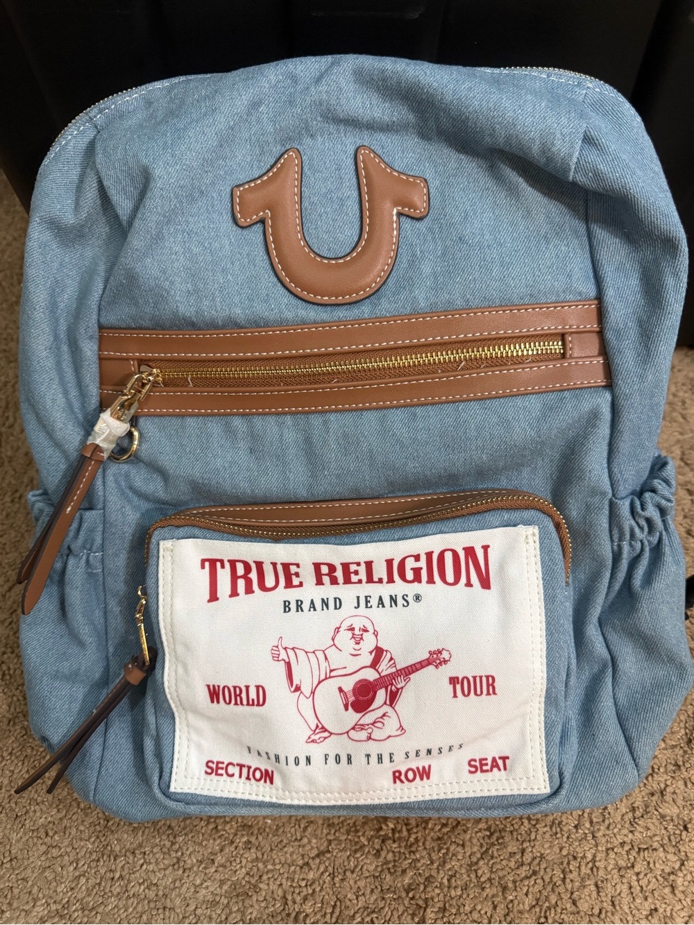 True Religion womens Light Blue Denim Backpack with Brown Trim